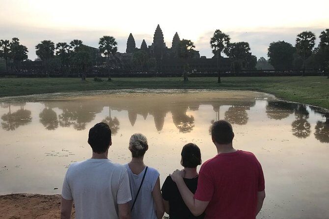 2-D Angkor temple tour with one sunrise in A/C vehicle and guide. - Day 2: Sunrise at Angkor Wat, then Angkor Thom’s Victory Gate