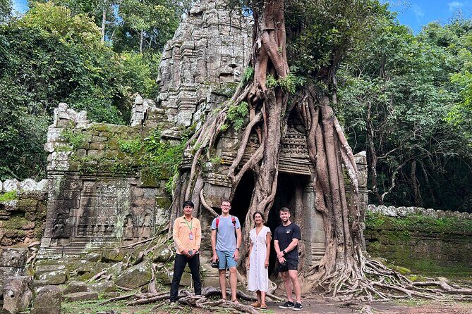 2-Day Angkor Wat Tour with Banteay Srei and Floating Village - Day 1 through Angkor Thom: from Bayon faces to temple-mountain views
