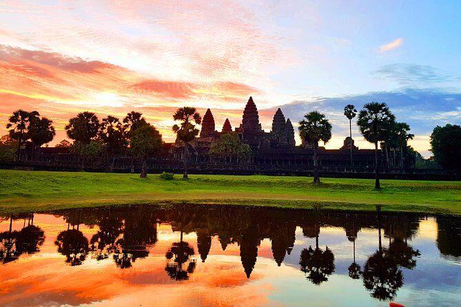 2-Days Private Tour in Angkor Sunrise, Banteay Srei and Beng Mealea Temple - Bayon and Ta Prohm: the Buddha faces and the root takeover