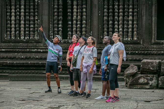 Angkor Sunrise Bike Tour / E-Bike or Tuk Tuk - Bayon and the face towers: seeing Angkor with less crowd pressure