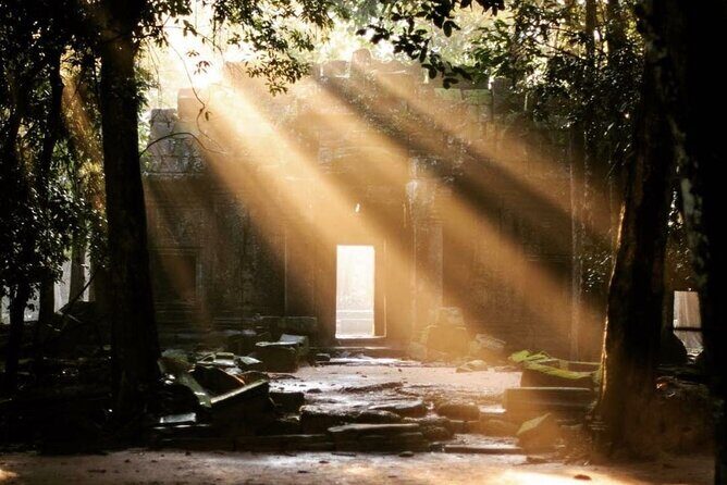 Angkor Sunrise Half-Day Tour with Private Vehicles & Tour Guide - Bayon Temple’s smiling faces: the best payoff per minute