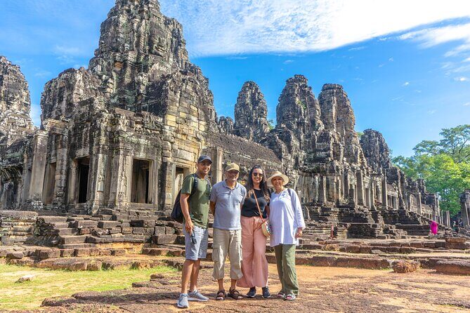 Angkor Sunrise Jeep Tour - Inclusive Breakfast & Lunch - Angkor Thom: stone demons, Bayon area details, and temple contrast