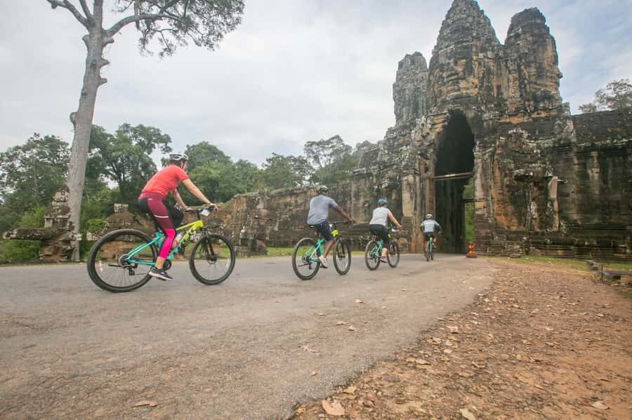 Angkor Wat: Guided Sunrise Bike Tour w/ Breakfast and Lunch - Bayon Temple and Ta Prohm: The Faces, the Jungle, and the Photo Moments