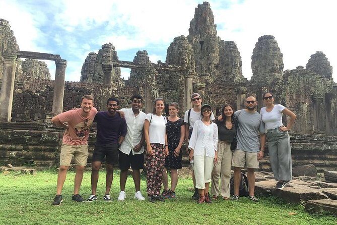 Angkor Wat Sunrise tour with Small - Group and Guide tours - Angkor Thom and Bayon: where the South Gate demons pull the eye