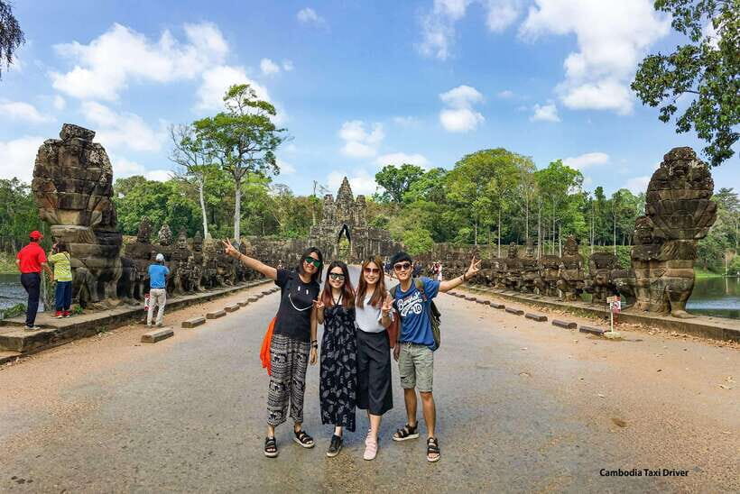 From Phnom Penh: Angkor Wat, Bayon, and Ta Prohm Day Trip - Bayon Temple: the smiling faces and the meaning behind the corridors