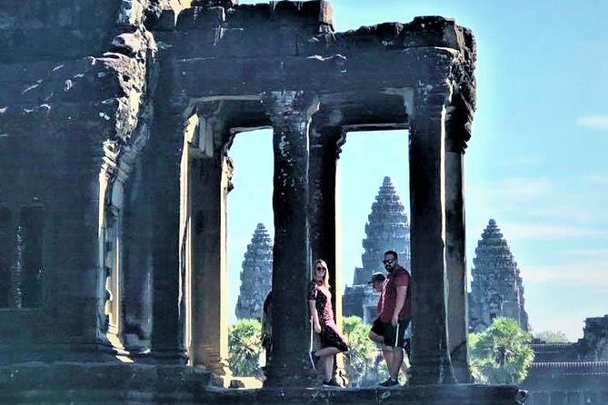 Full-Day Temples of Angkor Small Group Tour - Angkor Thom South Gate and Bayon: the faces that follow you