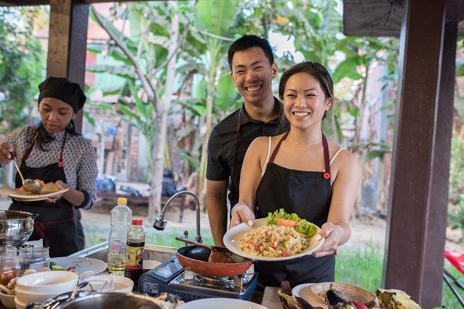 Khmer Cooking Class at a Local's Home in Krong Siem Reap - Inside the kitchen: open-air setup and hands-on help