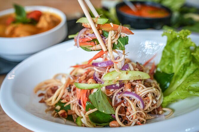 Old Siem Reap Sunset Food Tour by Tuk-tuk - Stop 1 in Temple Town: separating tourist menus from real Cambodian patterns