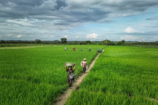 Phnom Penh Bike & Boat Sunset Tour / E-Bike Available - Cycling off the main roads and across Areiksart Ferry Port