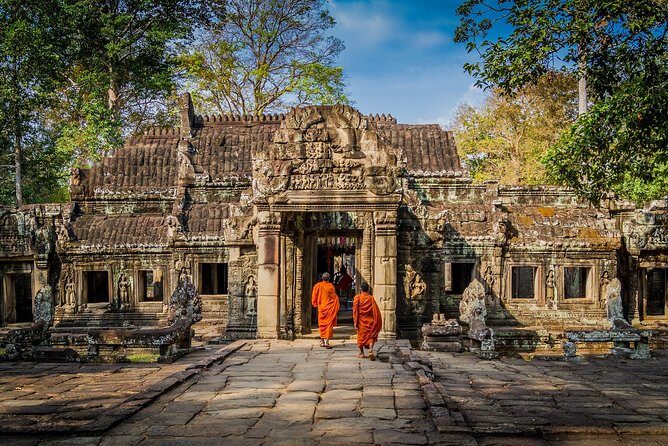 Private Temples Guided Tour (Angkor Wat, Ta Prom & Angkor Thom) - Ta Prohm: trees, restoration notes, and why it feels different
