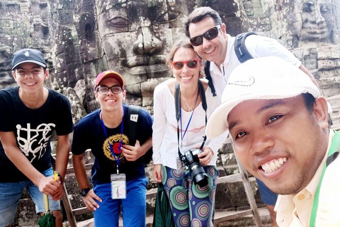 Private Tour Angkor Wat - Baphuon and Ta Prohm: big Buddha changes and jungle-root drama