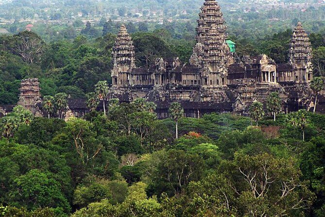 Shared Tour to Angkor Wat, Bayon and Ta Prohm Temples - Stop 3: Bayon Temple and the face-carved impact in 1 hour