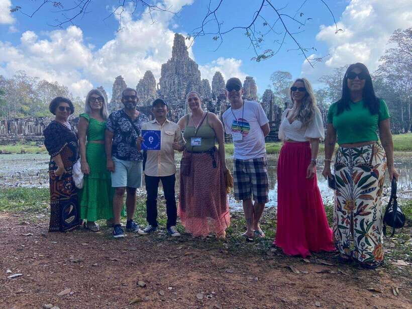 Siem Reap: 1-Day Angkor Wat Group Tour with Spanish Guide - Pickup times and transport: tuk-tuk for two, van for 3 to 6