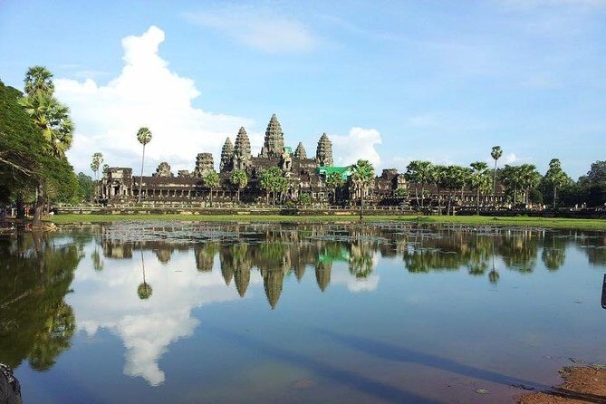 Siem Reap 2 Days Private Tour Angkor Wat and Floating Village - Day 1 at Angkor Thom: Gates, Bayon Smiles, and Ta Prohm’s Trees