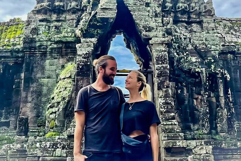 Siem Reap: Angkor Wat Sunrise and Full-Day Sightseeing Tour - South Gate City: stone figures and a final causeway walk