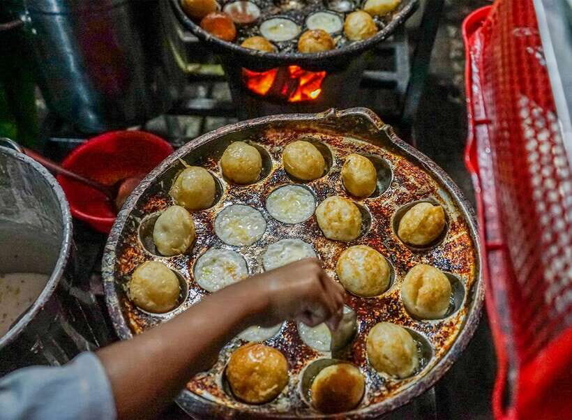 Siem Reap: Evening Food Tour with 10 Local Tastings - Lunchbox-style comfort at a local restaurant: spring rolls, tofu, snails, fruit