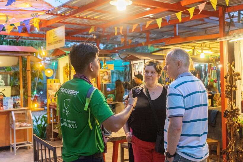 Siem Reap: Evening Food Tour with 10 Local Tastings - Street market time around Street 60: grilled chicken, cold drinks, and bug choices