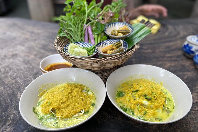 Siem Reap Evening Foodie Vespa Tour / Tuk Tuk Available - Stop 3: fruit, spring rolls, tofu, BBQ snails, and banh chok noodles