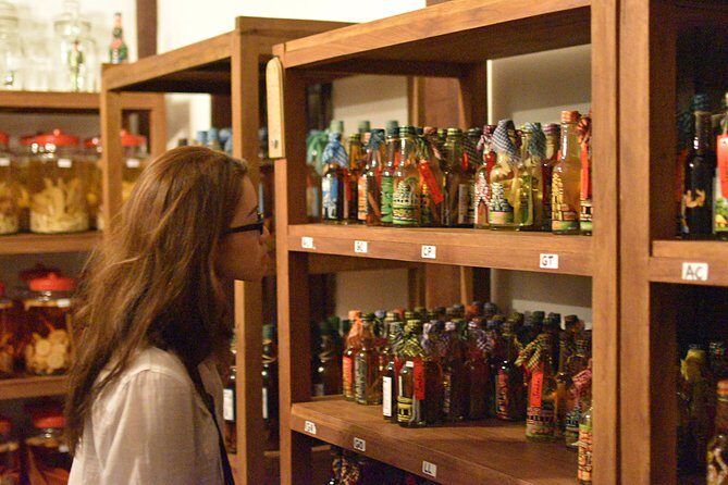Siem Reap Food Tour by Vespa - Stop 1: Sombai Cambodian Liqueur and souvenirs