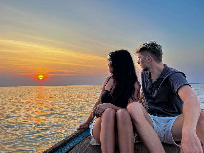 Siem Reap: Tonle Sap Sunset Boat Cruise with Transfers - Arriving at the lake port: switching from road to water