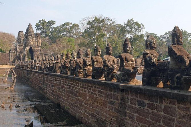 Sunrise Tour of Angkor Temples from Siem Reap - Bayon Temple: compact, face-filled, and easier to navigate