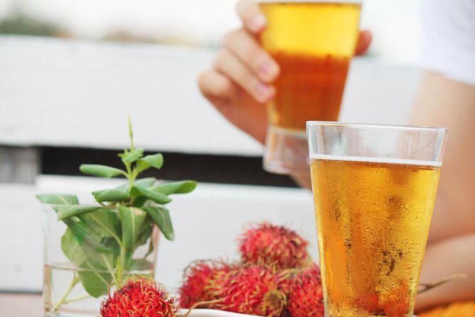 Sunset Cruise with unlimited beer & soft drinks -English speaking guide on board - Fishing village and stilted homes: a respectful look at riverside life
