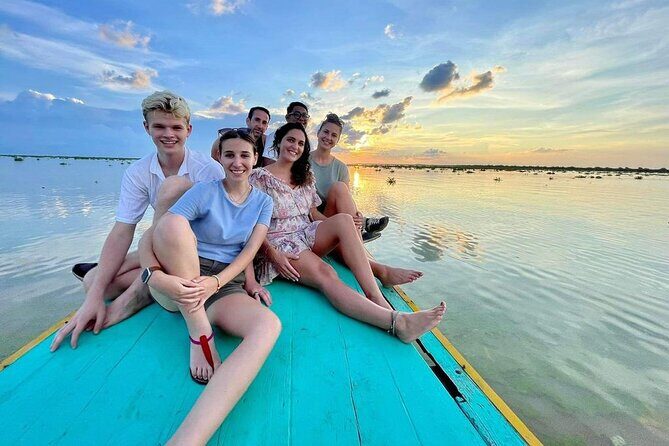 Sunset tour of Kampong Phluk stilts home village on the Tonle Sap - Transportation and comfort: modern vehicle, open boat, and what to bring